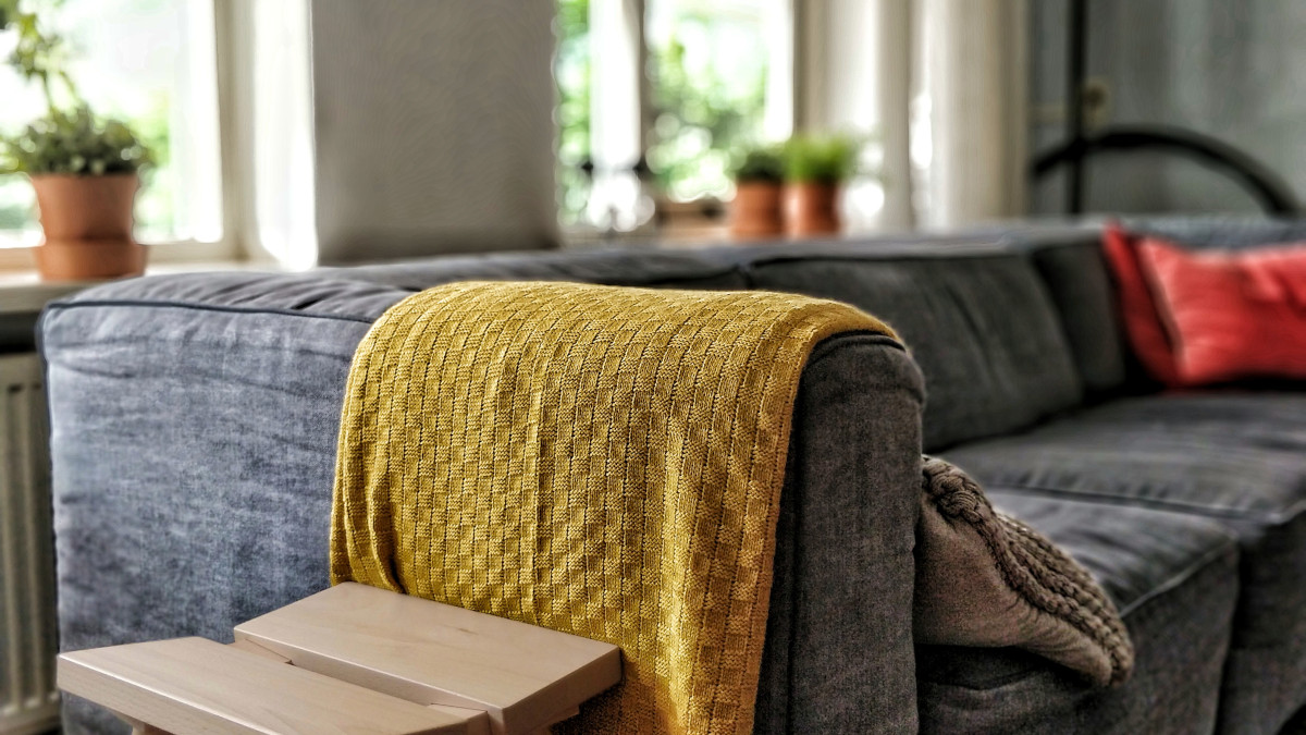 que tener en cuenta antes de elegir una manta de sofa